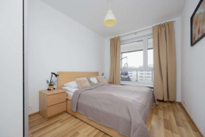 Bright Apartment with Parking near the PGE National Stadium by Noclegi Renters